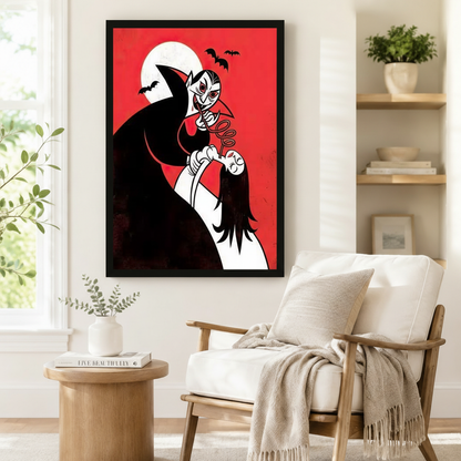 Framed mid-century cartoon style vampire and woman illustration with flying bats on red moon background displayed beside a white armchair in a Scandinavian reading nook