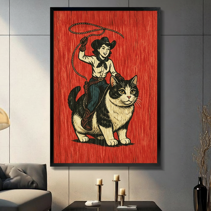 Retro cowgirl riding giant tuxedo cat vintage woodblock canvas art in black float frame on dark gray tiled wall above coffee table with candles and black vase