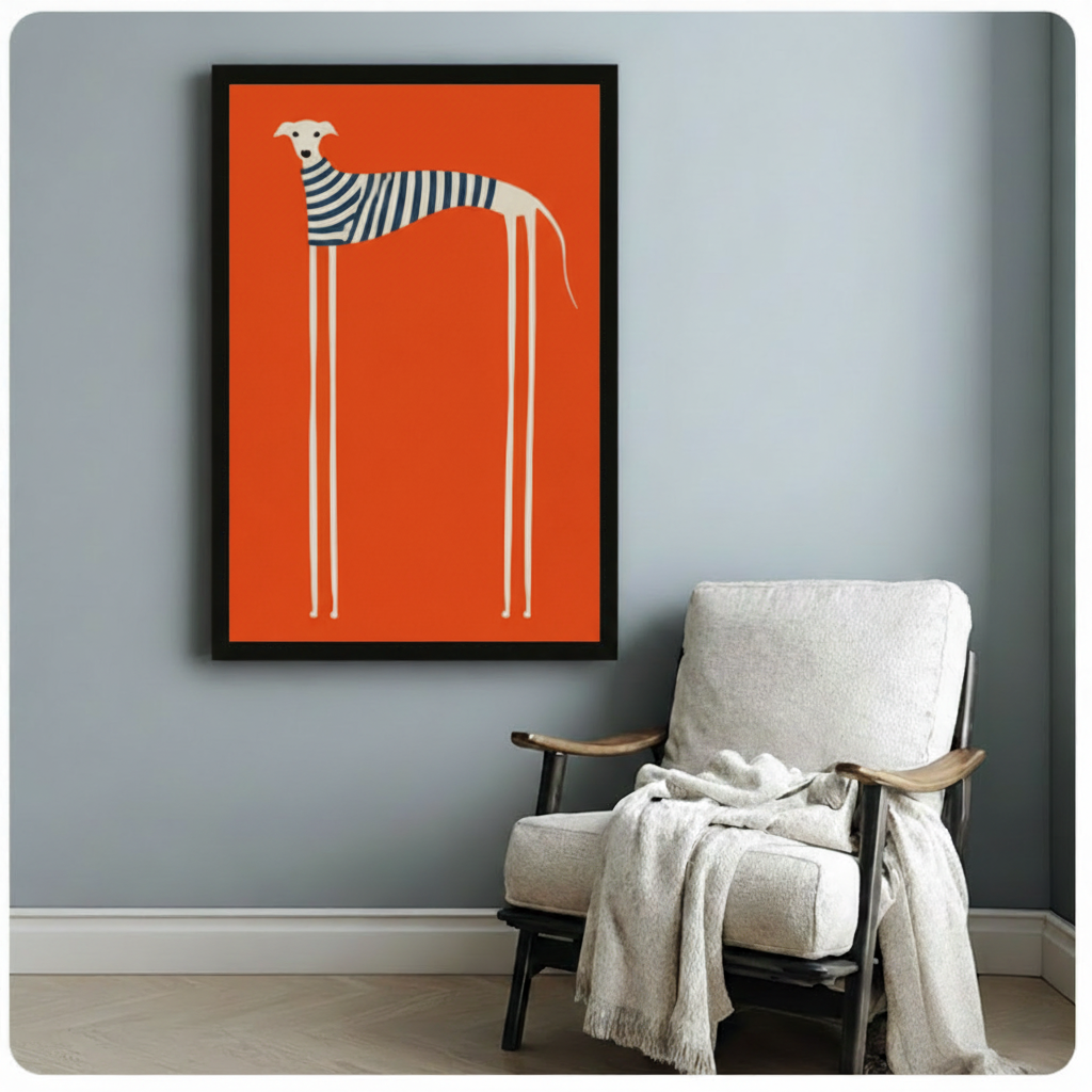 Framed retro-style wall art print featuring a tall minimalist greyhound in a striped top on an orange background, hung beside a cozy white armchair in a Scandinavian-style room