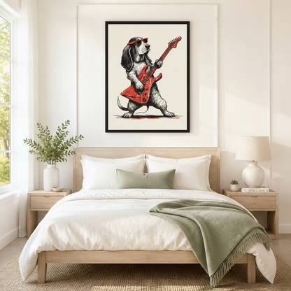 Black framed retro Basset Hound playing red electric guitar with red sunglasses wall art above a light oak bed with white linen bedding, a sage green fringed throw blanket, wooden nightstands, and a white ceramic table lamp in a bright Scandinavian bedroom