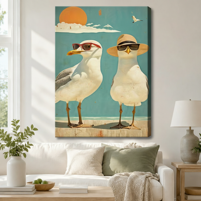 Funny retro seagulls with sunglasses and straw hat gallery-wrapped canvas hung above white sofa in a bright modern living room with sage green accents