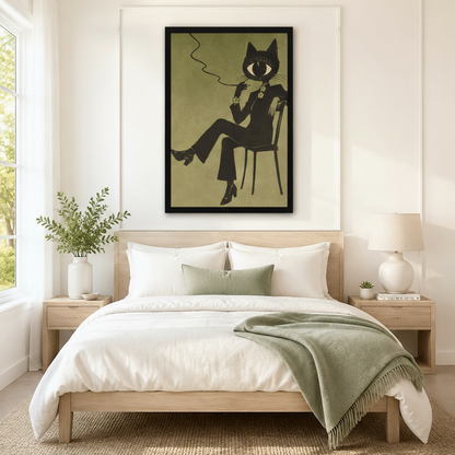Black framed vintage cat wall art above a wooden bed with white linen bedding, a sage green throw blanket, and matching nightstands in a minimal bedroom