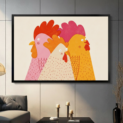 Black framed funny three roosters canvas wall art with pink white and orange chickens on cream background displayed in a modern dark gray living room with gray sofa and candlestick holders
