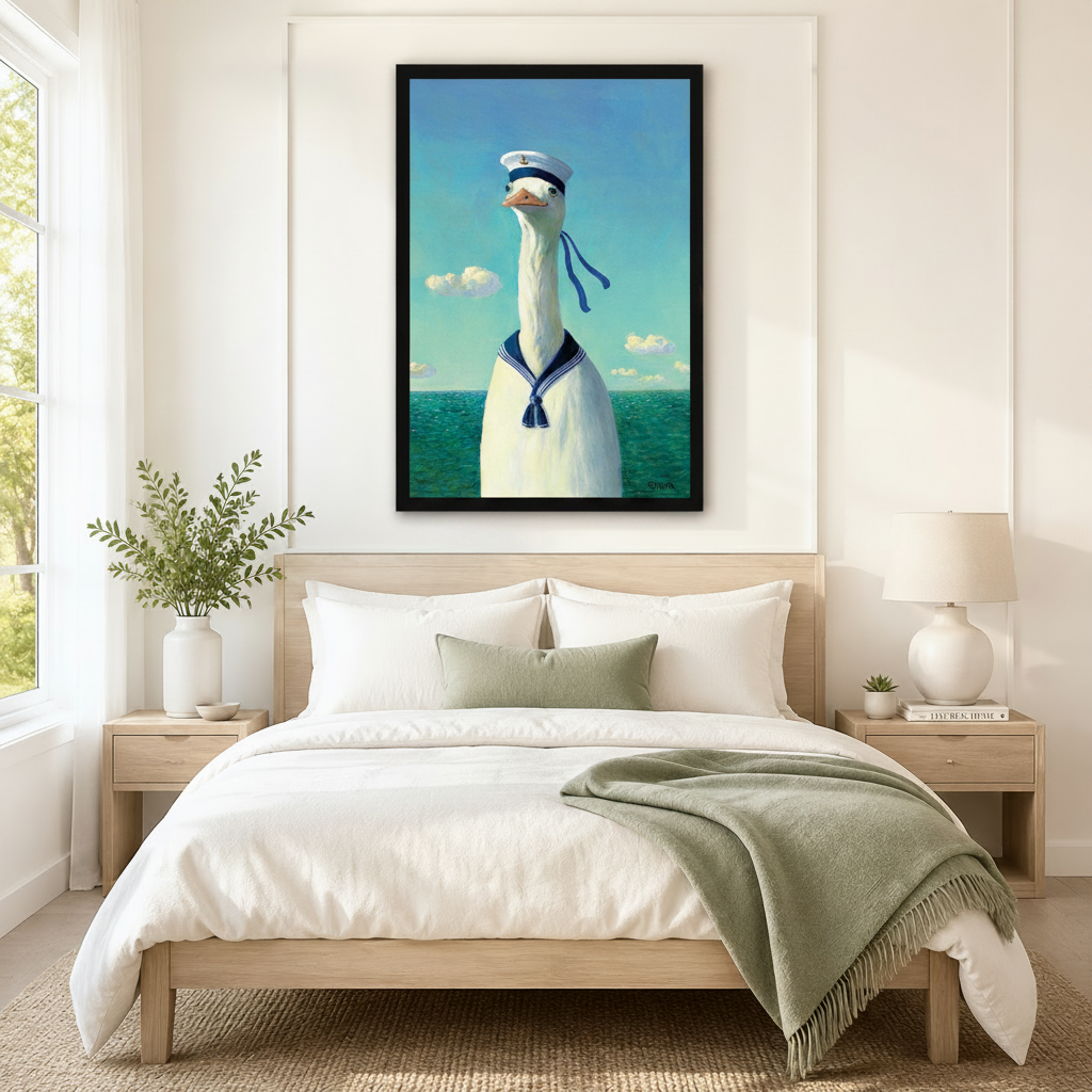 Large framed sailor goose ocean print centered above a neutral linen bed in a calm coastal bedroom