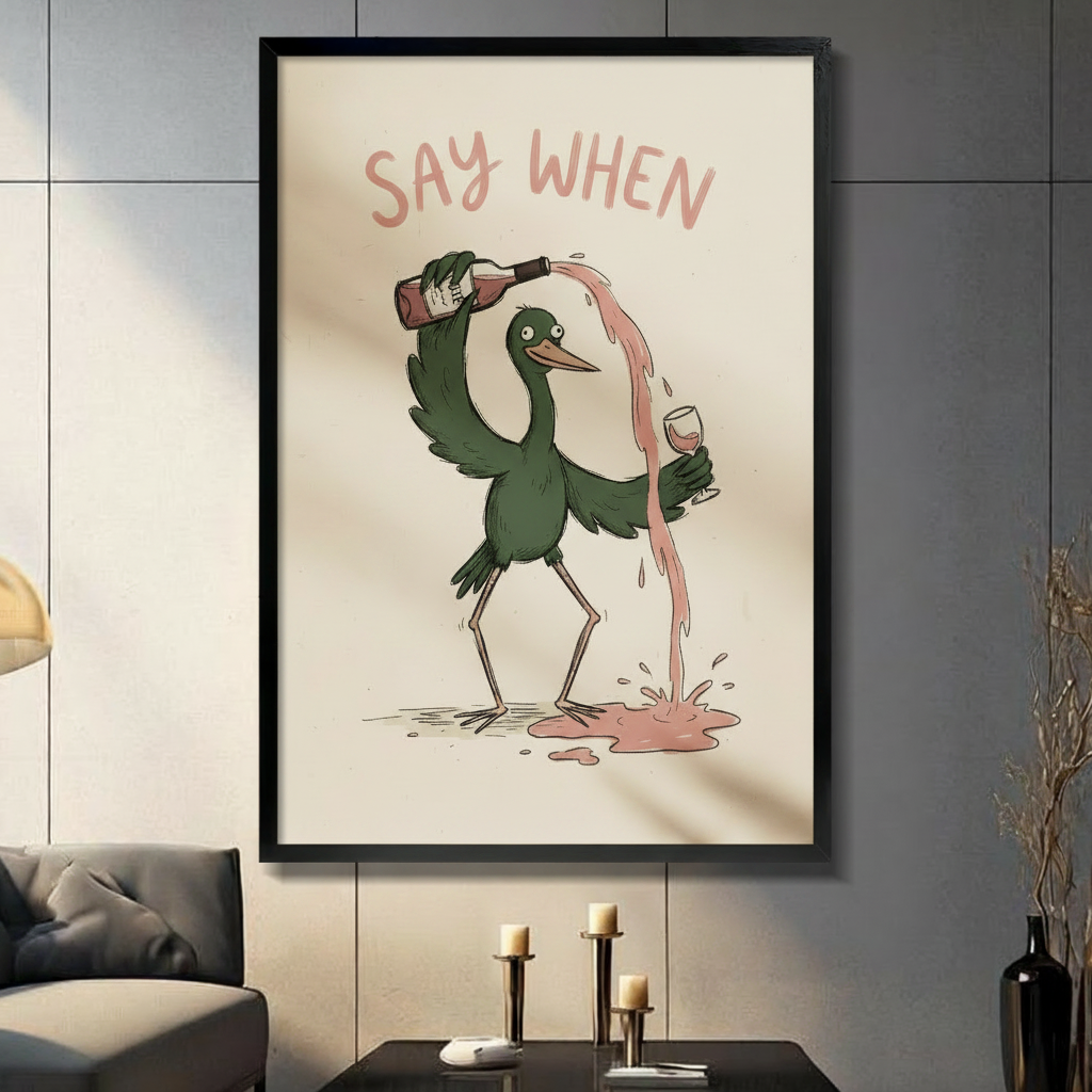 Framed say when funny bird pouring wine canvas print displayed in moody living room with candles