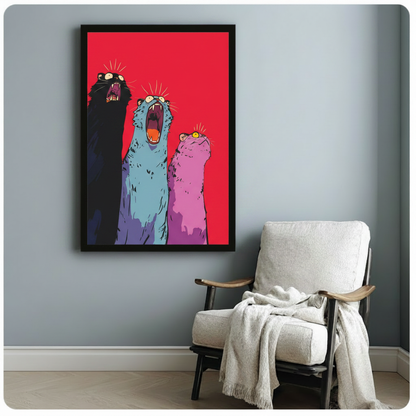 Funny screaming cats framed wall art print in black frame above white accent chair with throw blanket on light gray wall