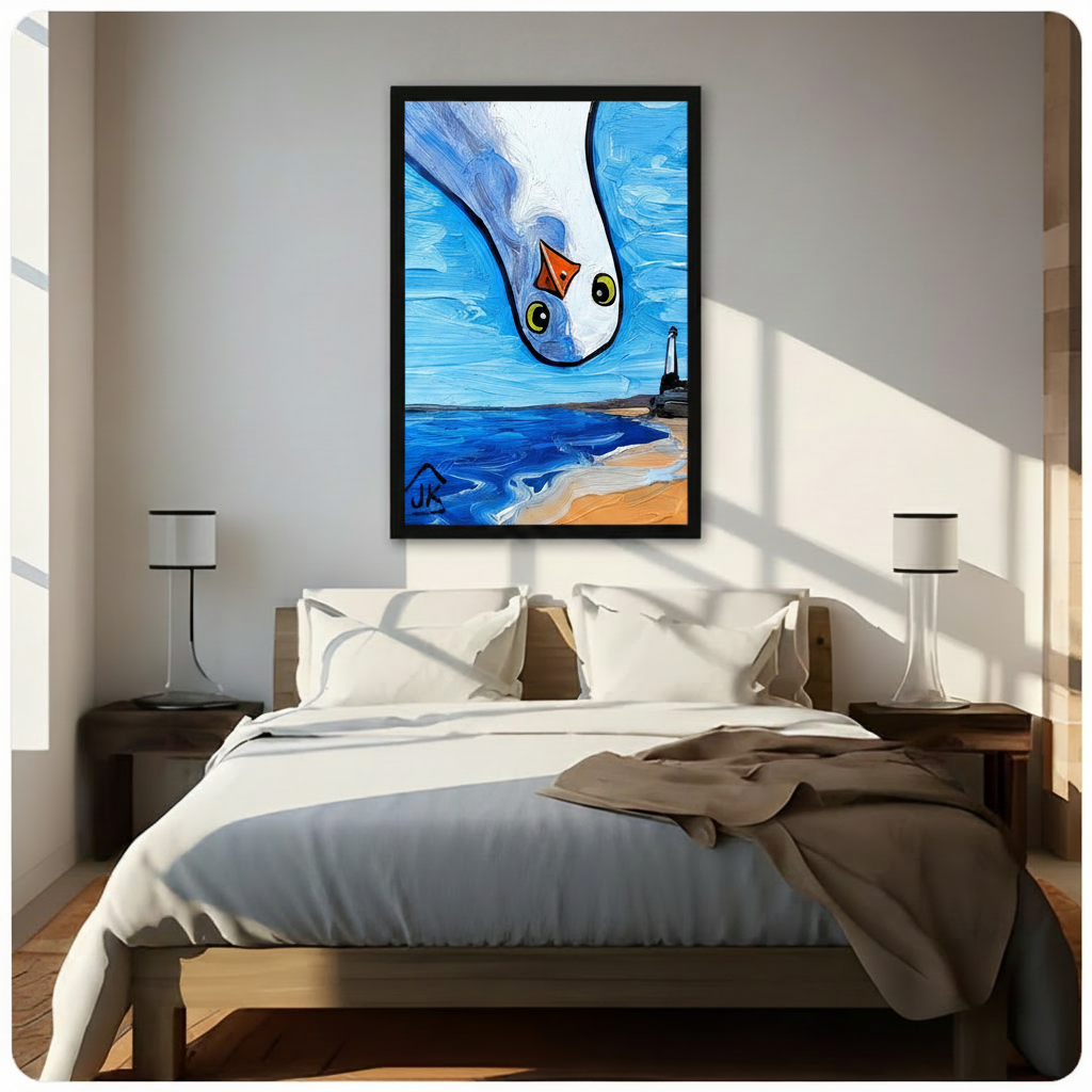 Humorous seagull close-up framed wall art hanging above bed in bright sunlit modern bedroom with twin lamps