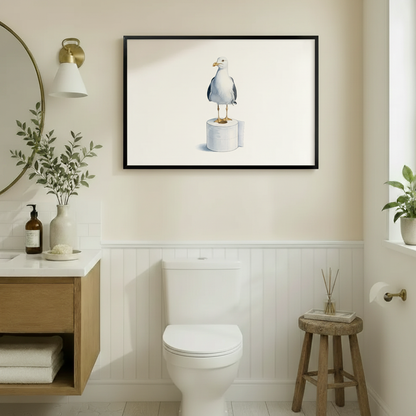 Witty seagull on toilet paper roll framed art print above toilet in warm beige bathroom with wooden vanity and round mirror