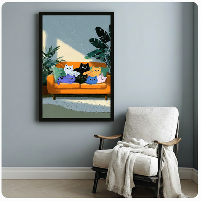 Framed seven colorful cats lounging on orange sofa wall art beside wooden accent chair with linen throw - whimsical flat illustration cat family canvas print with monstera leaves and powder blue tones for reading nook