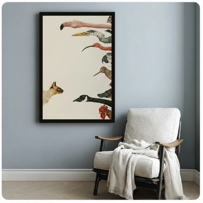 Siamese cat facing bird heads framed vintage natural history canvas beside wooden armchair with white throw on pale blue wall – quirky eclectic animal illustration for reading nook or study