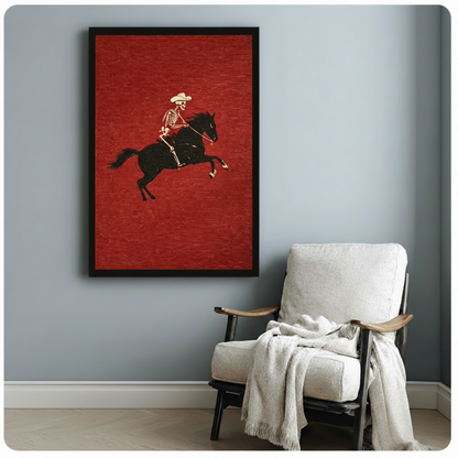 Black framed skeleton cowboy riding black horse retro woodcut print bold red background western gothic canvas art beside lounge chair