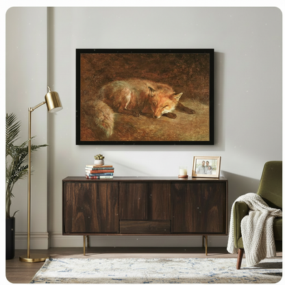 Black framed antique sleeping red fox oil painting canvas art hung above a dark walnut sideboard with stacked books and family photo in a modern living room with gold floor lamp and olive green armchair
