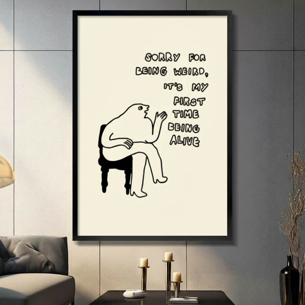Funny quirky line art print "Sorry For Being Weird It's My First Time Being Alive" in black frame displayed in modern living room