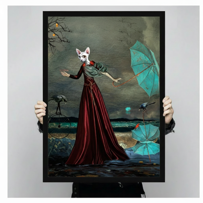 Surreal sphynx cat woman in dark red velvet dress holding teal umbrella with scattered parasols and birds on stormy shore framed wall art print held up for size reference against a light gray neutral background