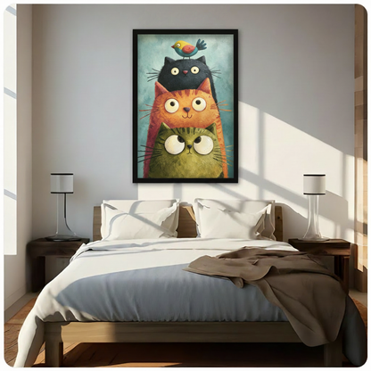 Whimsical impasto oil painting of three round big-eyed cats stacked in a tower a green cat an orange tabby and a black cat with a tiny colorful bird on top against a soft teal background adorable cat wall art framed print above a bedroom with white linen bedding and wooden bedside tables