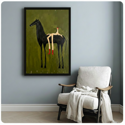 Surrealist naive oil painting of an elongated cream stick figure rider with a red head and red boots mounted on a tall black horse against a distressed olive green textured background with gold scratch marks quirky equestrian wall art framed print beside a white linen armchair on a blue gray wall