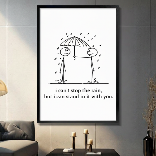 Framed minimalist stick figure couple sharing umbrella in rain canvas print on dark grey tile wall in modern living room - sweet i can't stop the rain but i can stand in it with you quote wall art in black and white for contemporary home decor