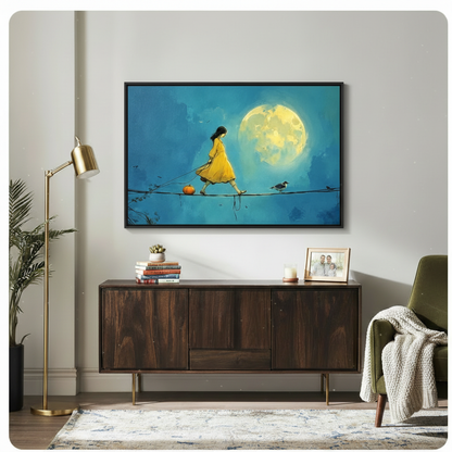 Black framed surreal storybook girl walking a tightrope with a glowing pumpkin and small bird under a radiant full moon canvas art in deep teal oil-painted tones, displayed above a dark walnut sideboard in a mid-century modern living room with a brass floor lamp, olive green velvet armchair, stacked books, and a tall indoor palm plant