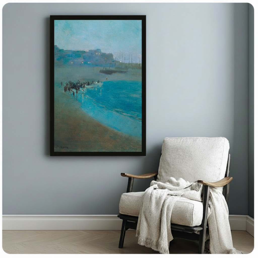 Framed teal nocturne coastal oil painting print hung above white linen accent chair in calm minimalist room