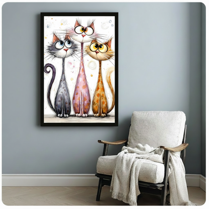 Whimsical watercolor illustration of three quirky long-necked cats with oversized eyes and glasses standing side by side on a white background funny cat trio wall art framed print beside white armchair on blue-gray wall