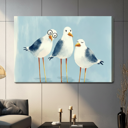 Three chubby seagulls with funny expressions one wearing round glasses on a soft blue background funny coastal seagull wall art stretched canvas in a living room with gray sofa candle holders and black vase