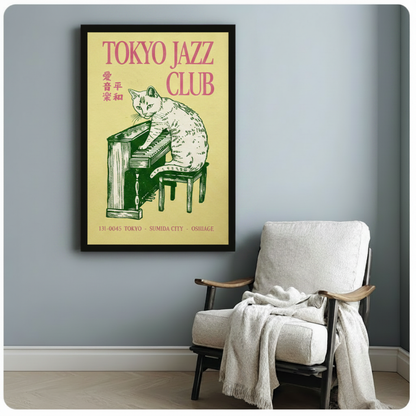 Retro Tokyo Jazz Club cat at piano framed art print in black frame on blue-gray wall beside linen armchair, vintage Japanese music poster wall decor for reading nook or study