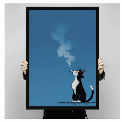 Both hands holding large framed tuxedo cat smoking print, full artwork view of cool black and white cat with cigarette and smoke curl against deep steel blue background