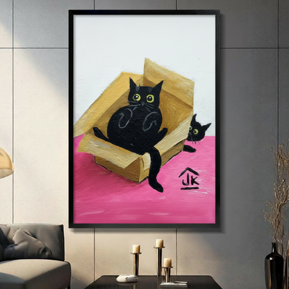 Two black cats with glowing green eyes in and beside a cardboard box, bold oil painting on pink and white background, black framed wall art in modern living room with dark sofa and candle holders