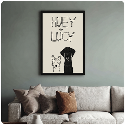 Black framed Huey and Lucy dog sketch wall art print on blue-grey wall above linen sofa