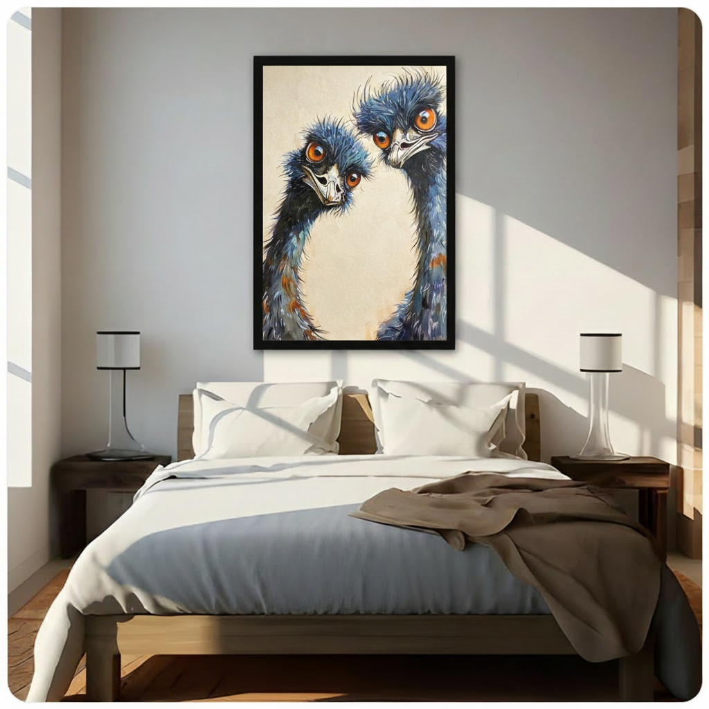Two quirky emus with messy blue-gray feathers and striking orange eyes huddled together on a cream background humorous bird portrait framed print above a bedroom with white linen bedding dark wood bed frame and white table lamps