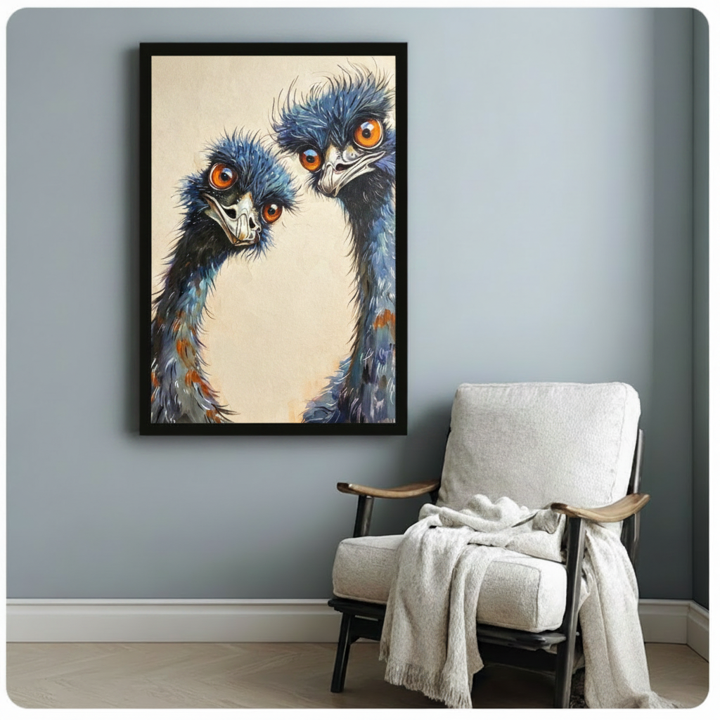Two emus with fluffy blue-gray plumage and large orange eyes leaning in together expressive bird oil painting framed print beside a white linen armchair with a cozy throw blanket