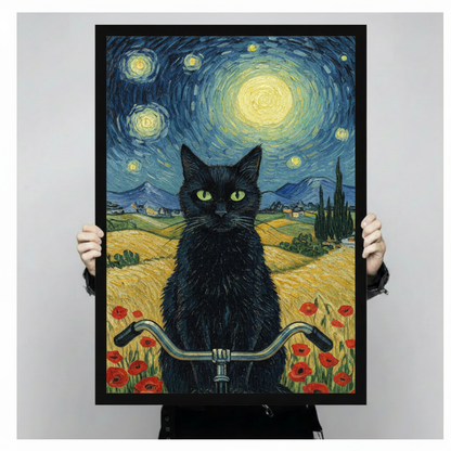 Whimsical black cat bicycle rider framed poster print held up against a neutral gray background, showing Van Gogh oil painting texture and black frame detail
