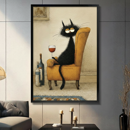 Framed vintage humorous illustration canvas wall art of a fluffy black cat lounging on a golden wingback armchair holding a red wine glass with wine bottles beside it on an aged beige background displayed on a dark grey wall in a modern living room