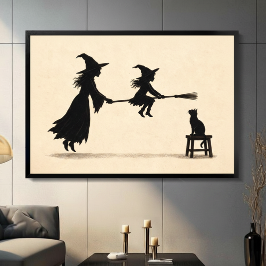 Vintage silhouette two witches sharing broomstick with black cat framed wall art in modern living room with dark gray sofa and candlesticks