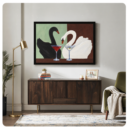 Cocktail swans canvas wall art decorates a wooden sideboard beside a brass lamp and green reading chair.