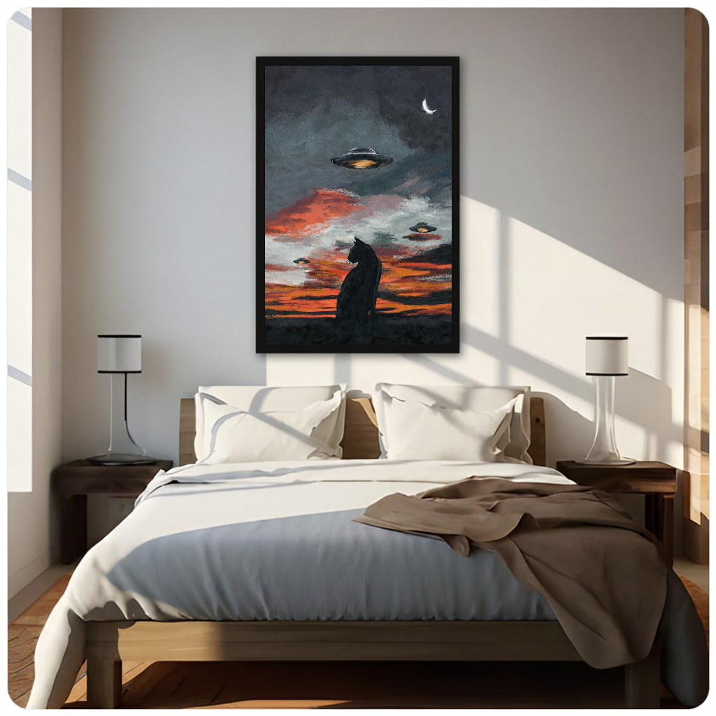 Black cat and ufos framed canvas displayed above a bed in a neutral bedroom.