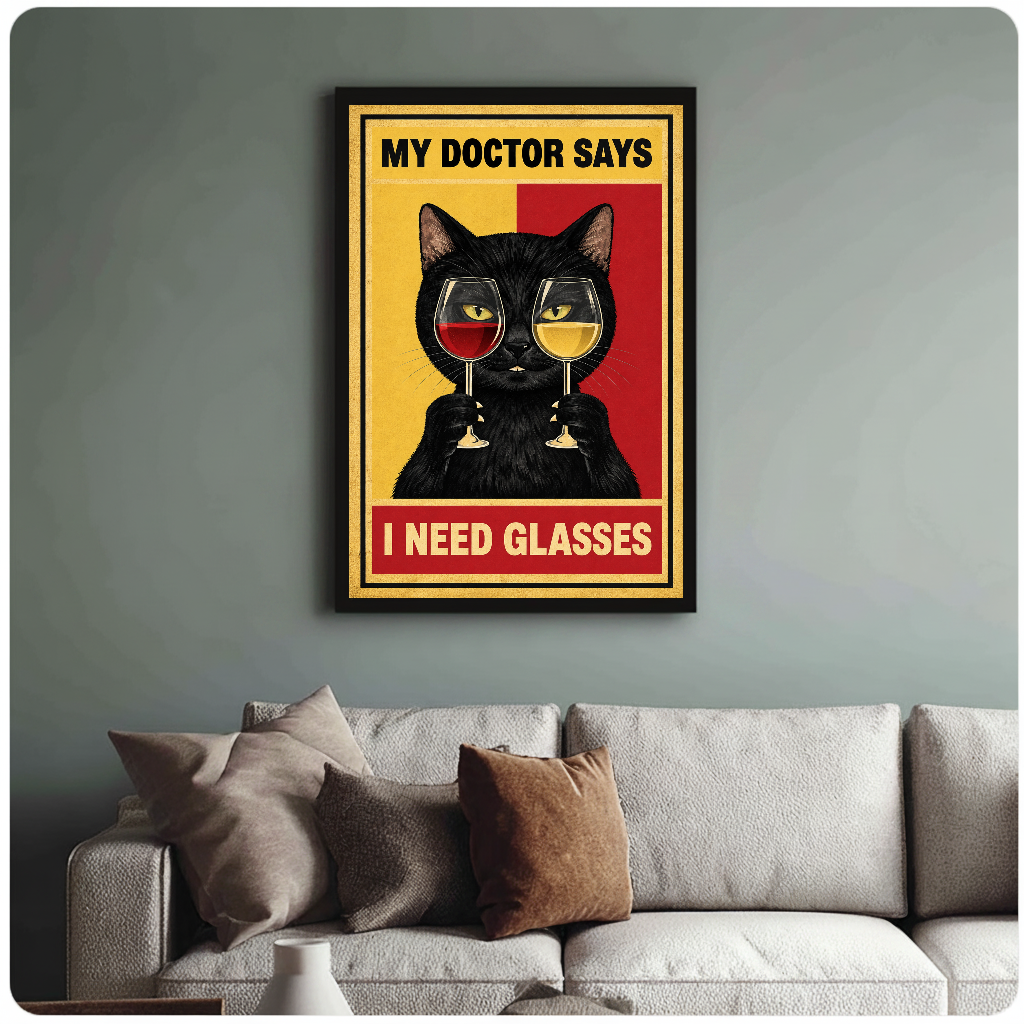 Wine cat artwork with gold border black framed canvas above a light sofa in a living room.