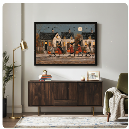 Halloween village parade framed canvas above a wooden cabinet in a living room.