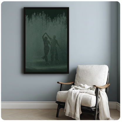 Dancing couple in green fountain spray in framed canvas beside a light armchair.