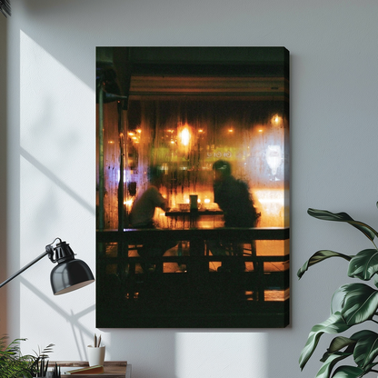 Warm cafe silhouettes behind a rainy window on stretched canvas with a visible wrapped edge.
