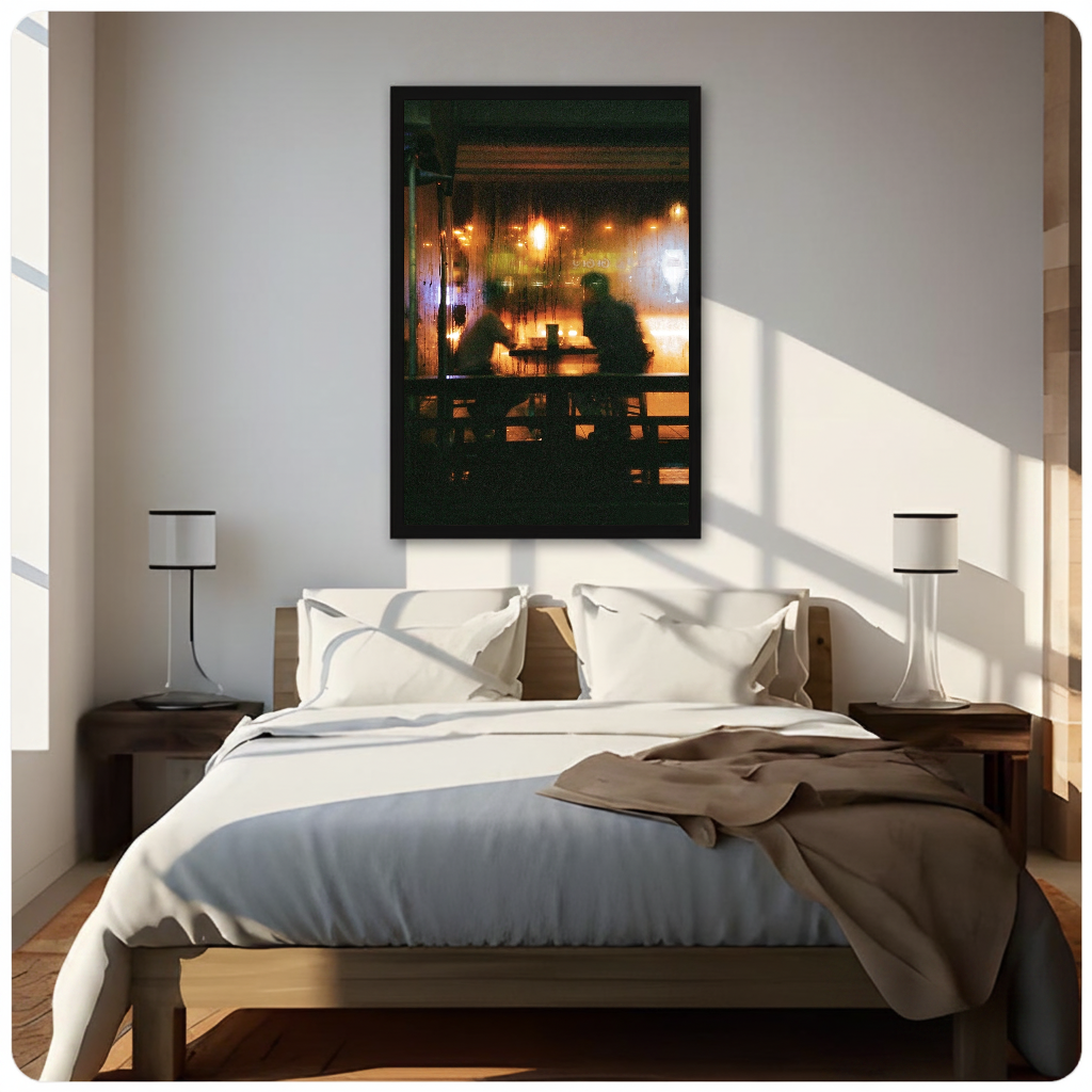 Warm cafe silhouettes behind a rainy window displayed as framed canvas above a neutral bed.