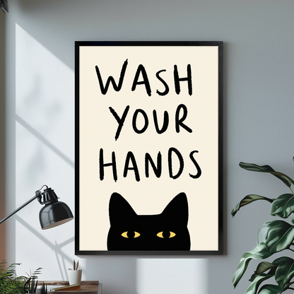 Black cat bathroom reminder with yellow eyes displayed in black framed canvas beside a lamp.