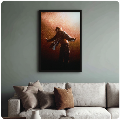 Figure with open arms in warm backlit rain in framed canvas above a light living room sofa.
