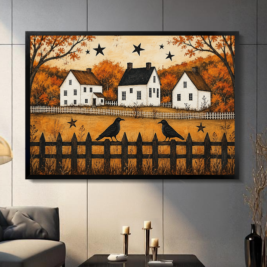 Black framed autumn crows and cottages canvas artwork displayed on a gray wall in a neutral room.