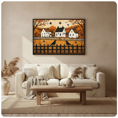 Framed autumn crows and cottages wall art displayed above a neutral sofa with soft cushions.