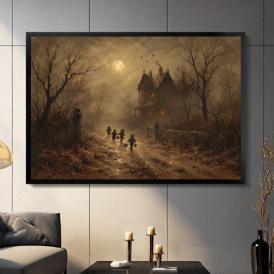 Black framed moonlit haunted house canvas artwork displayed on a gray wall in a neutral room.