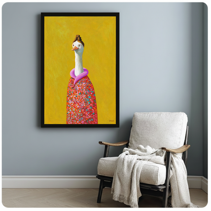Framed floral goose canvas artwork displayed beside a reading chair with a soft blanket.