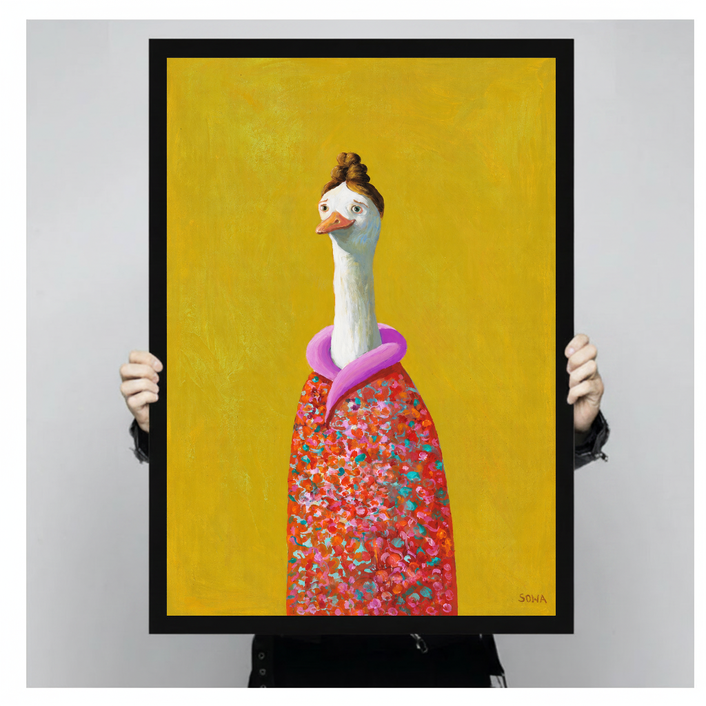 A person holds framed floral goose canvas artwork to demonstrate its portrait proportions.