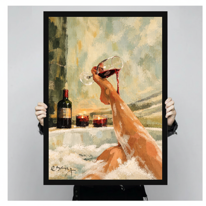 A person holds framed bathtub wine canvas artwork to demonstrate its portrait proportions.