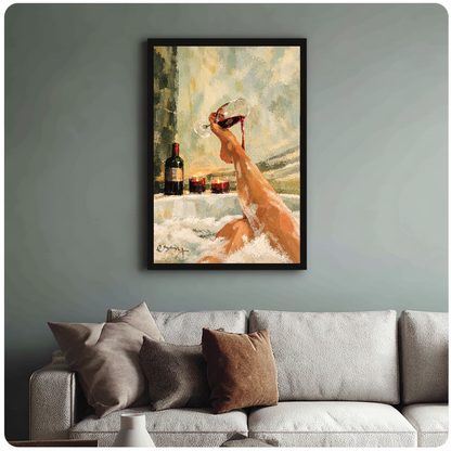 Framed bathtub wine wall artwork displayed above a neutral sofa with soft cushions.